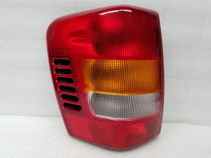 TYC Rear Tail Light Assembly Pair For 1999-2001 Jeep Grand Cherokee – With Bulbs, Black Housing